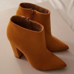 Never worn Shoe Dazzle Booties.